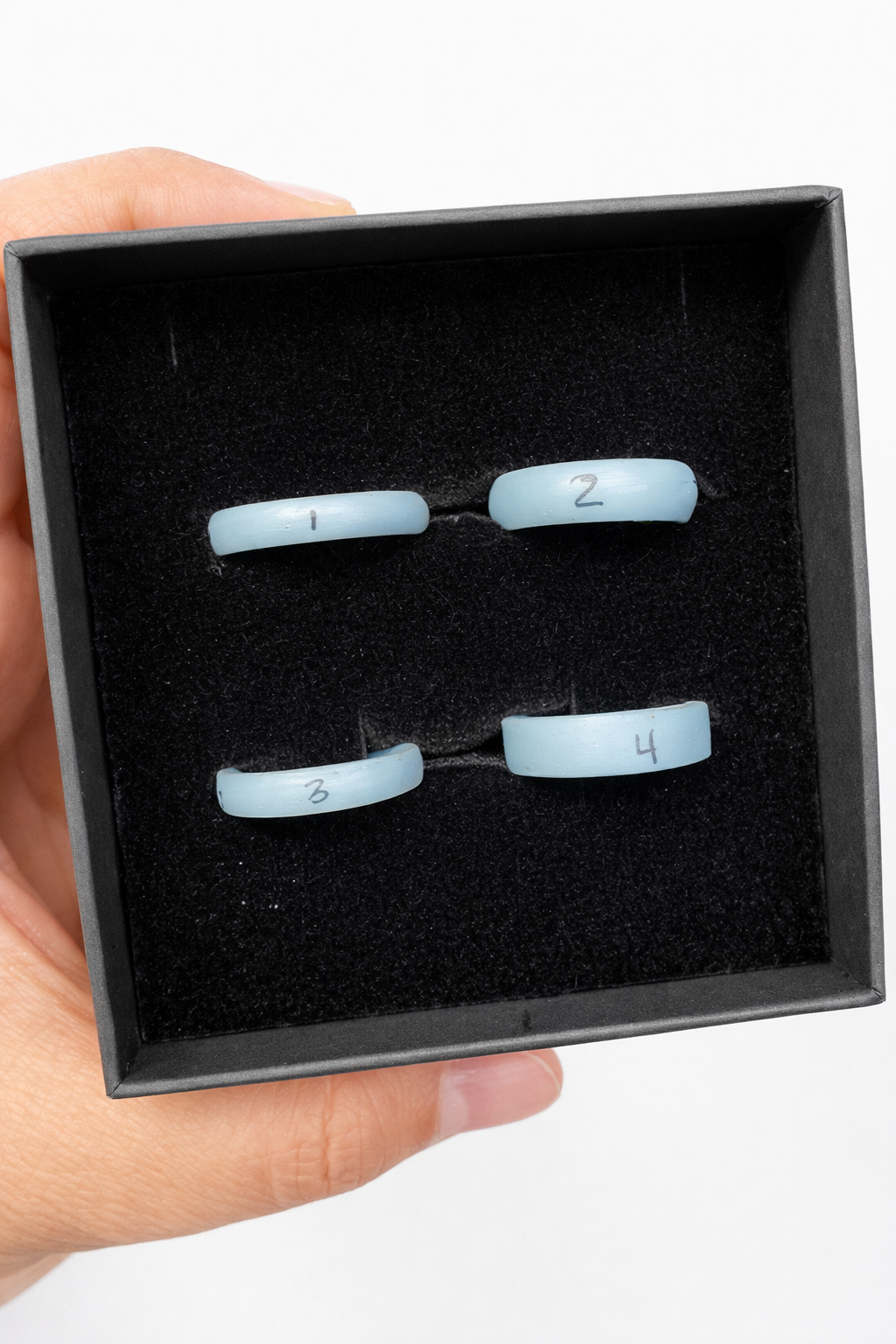 Custom wax ring molds made by Alexis Pavlantos for individual clients, allowing them to try on their ring design before it’s cast.